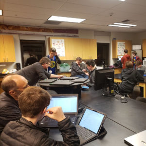 Spartronics students working on computers